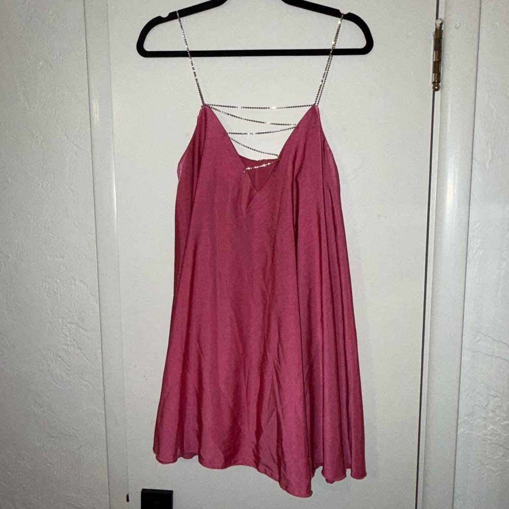Silky pink mini dress; rhinestone straps